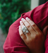 Woman Modeling Diamond Engagement Rings from Fink's Jewelers