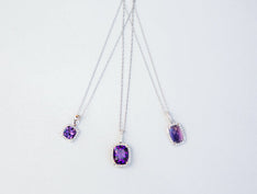 Three amethyst pendant necklaces for February birthstone gifts